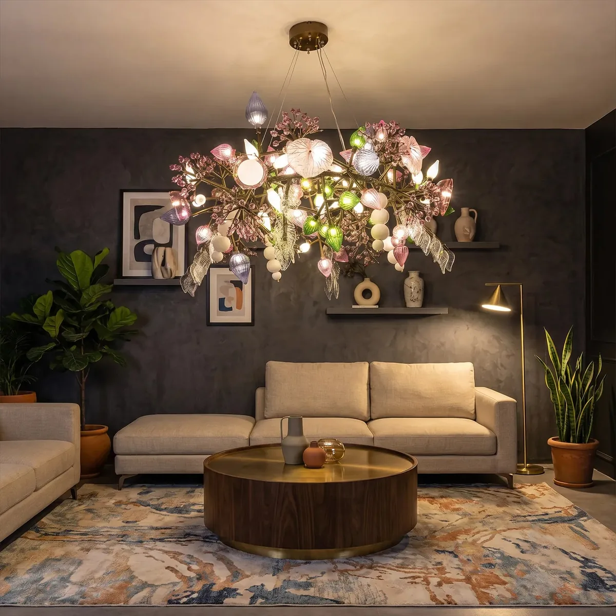 Pandora Chandelier hanging in a dark panelled living room with a sofa and coffee table